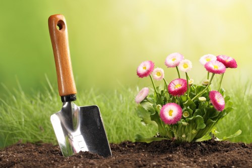 Professional gardener in Osterley preparing safely for garden work